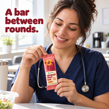 Crunchy Fruit Bar Apricot — nurse holding the wrapped bar on a break