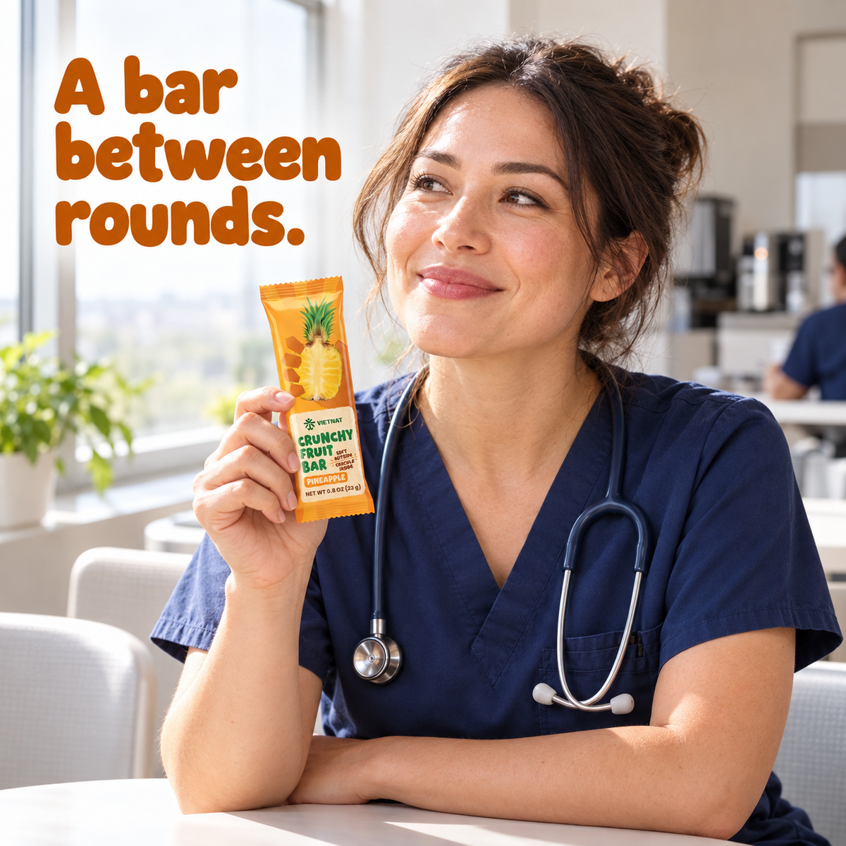 Crunchy Fruit Bar Pineapple — nurse holding the wrapped bar on a break