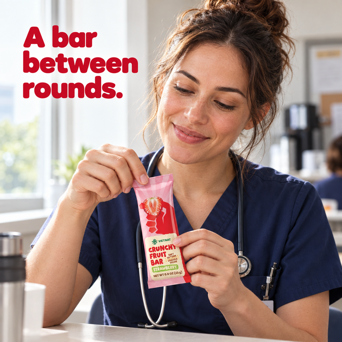 Crunchy Fruit Bar Strawberry — nurse holding the wrapped bar on a break