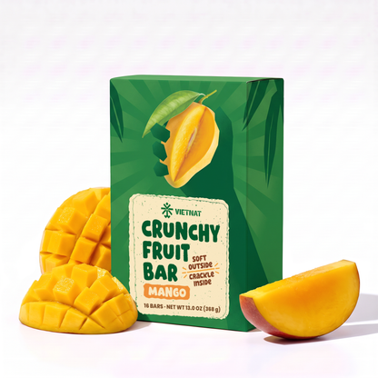 Crunchy Fruit Bar Mango box of 16 bars next to fresh mango