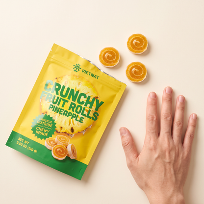 VietNat pineapple rolls next to a hand for size