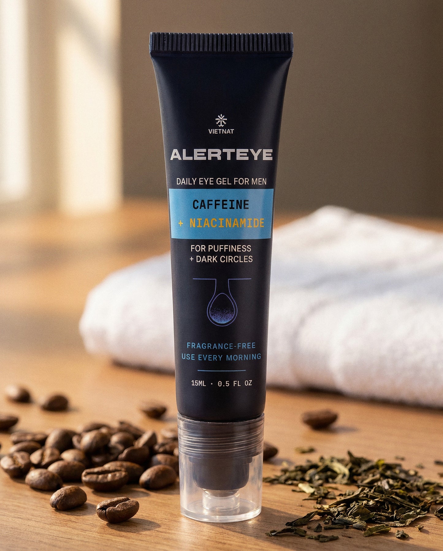 AlertEye tube with coffee beans and green tea leaves, the caffeine and EGCG sources