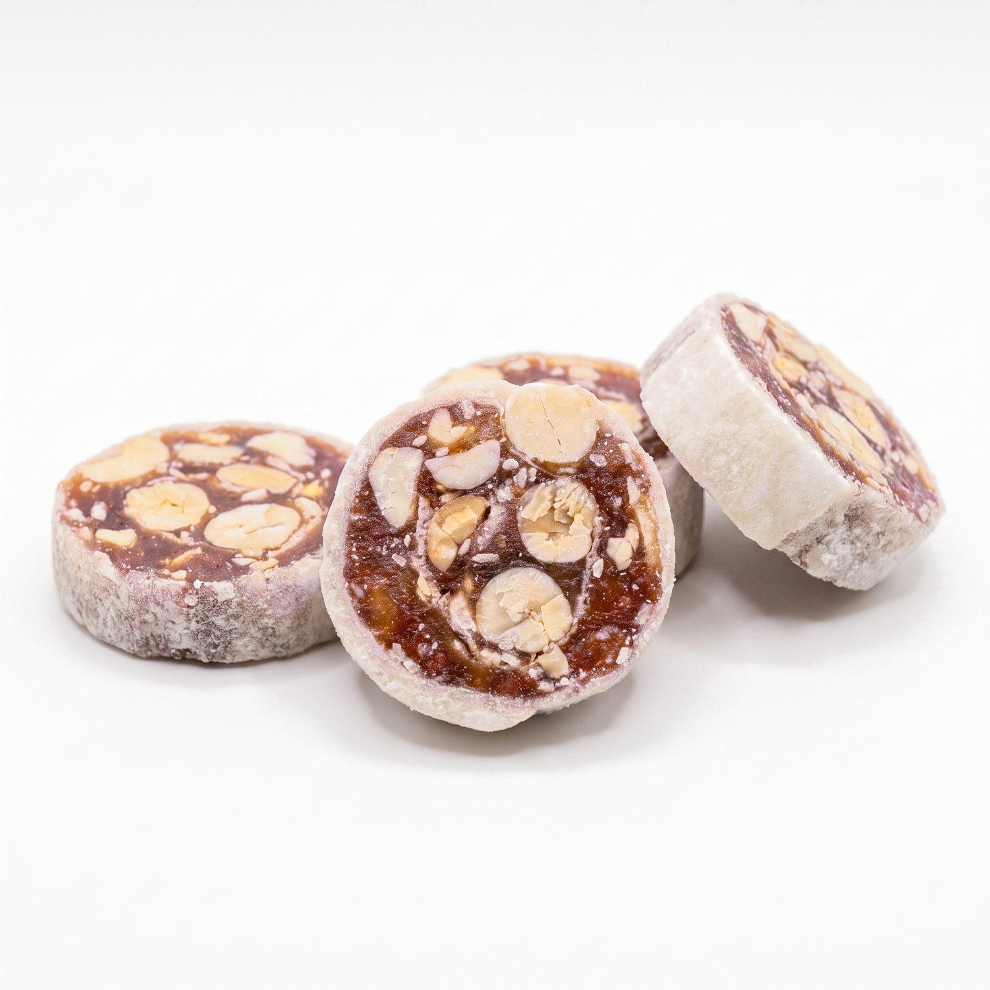 Banana peanut fruit rolls close up on white