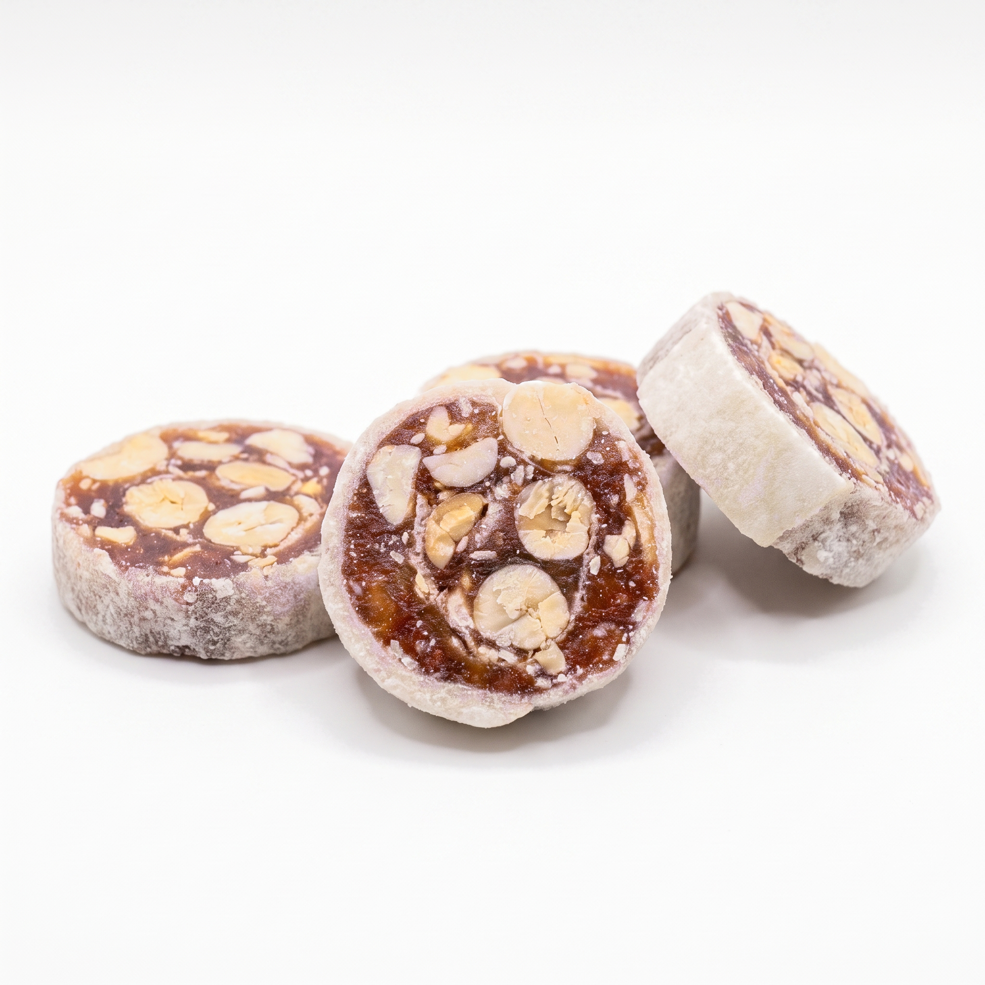 Banana peanut fruit rolls close up on white