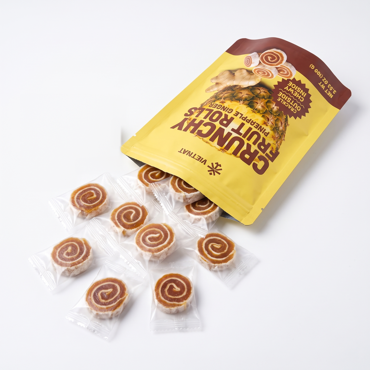 An open bag of pineapple ginger fruit rolls with individually wrapped bites