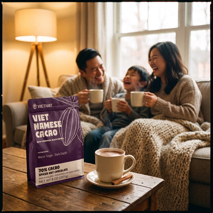 A family sharing mugs of drinking chocolate in the evening, the pouch on the table