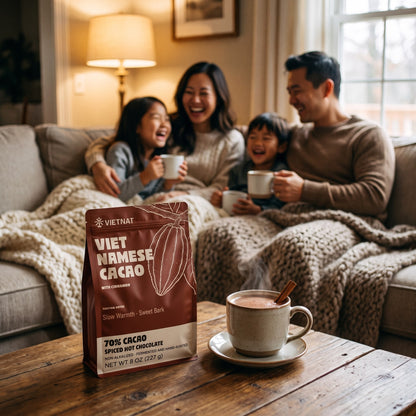 A family sharing mugs of drinking chocolate in the evening, the pouch on the table