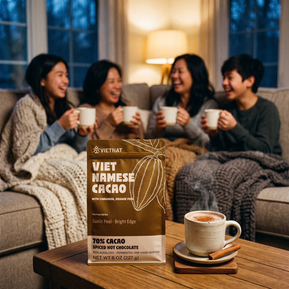 A family sharing mugs of drinking chocolate in the evening, the pouch on the table