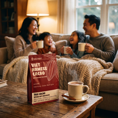 A family sharing mugs of drinking chocolate in the evening, the pouch on the table